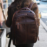 Brown Jack Georges mid-size tech backpack with multiple compartments and padded straps, designed for everyday professional use.