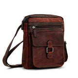 Brown Jack Georges Voyager Collection Crossbody bag with adjustable strap and multiple compartments, crafted from high-quality leather.