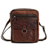 Brown Jack Georges Voyager Collection crossbody bag with adjustable strap and multiple compartments, stylish and functional.