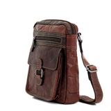 Brown Jack Georges Voyager Collection crossbody bag with adjustable strap and multiple compartments, designed for everyday use.