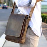 Jack Georges Arizona crossbody messenger bag in tan leather with adjustable strap and front pocket.