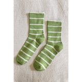 Black Le Bon Shoppe Wally Socks with colorful striped accents, mid-calf length, soft knit fabric, and ribbed cuff design.