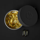 Matador waterproof travel canister 100ml, compact outdoor accessory for storing small essentials, with a secure lid and durable design.