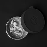 Matador waterproof travel canister 100ml, compact accessories for secure storage, shown in overhead view with a sleek design.