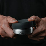 Matador waterproof travel canister 100ml accessory with secure screw-top lid, ideal for toiletries and liquids.