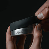 Matador waterproof travel canister in 100ml size, compact accessory for secure storage of liquids during travel.