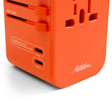 Black Matador global travel adapter for accessories, compact design with universal plug compatibility for international travel.