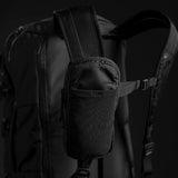 Matador Speed Stash accessory in black, compact and lightweight storage pouch with zipper closure, designed for outdoor gear organization.