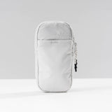Matador Speed Stash accessories in white, compact and lightweight storage pouch with zipper closure, designed for outdoor gear.