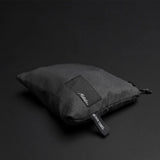 Charcoal Matador Nanodry packable beach towel displayed as a lightweight, quick-drying accessory perfect for beach outings.
