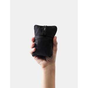 Matador blackout travel pillow in black, soft fabric, designed for comfortable rest during travel, part of accessories collection.