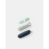 Matador travel earplugs kit with compact case and multiple earplug sizes, designed for noise reduction during travel.