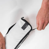Matador packing cube set includes three white nylon organizer cubes for efficient travel storage and organization.