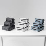 Set of three Matador packing cubes in various sizes, designed for organized travel storage and packing efficiency.