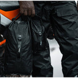 Black Matador Flatpak Dry Bag 2L shown with secure roll-top closure and compact design for waterproof storage.
