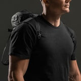 Matador Freefly 30L packable duffle bag made of durable fabric, shown folded and expanded for travel and storage.