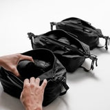 Matador Gear Cube Set with eight compact, organized travel and camping cubes in various sizes for efficient packing.