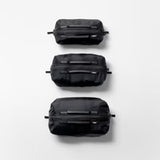 Matador Gear Cube Set with compact, multi-functional travel organizers in various sizes and colors for efficient packing.