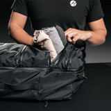 Matador SEG45 travel pack with multiple compartments, black nylon material, and adjustable straps for comfortable carrying.