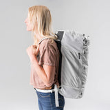 Matador SEG45 Travel Pack open showing multiple compartments and gear organized inside, compact and lightweight travel backpack.
