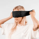 Matador blackout sleep mask with built-in earplugs for complete darkness and noise reduction, comfortable and lightweight for restful sleep.