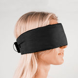 Matador blackout sleep mask with earplugs for blocking light and noise, soft fabric and adjustable strap for comfortable sleep.