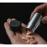 Matador waterproof travel canister in 40ml size, compact and durable for storing small liquids during travel.