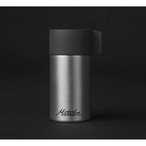 Matador Waterproof Travel Canister 40ml in black with secure screw-top lid for durable, portable storage of liquids during travel.