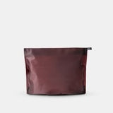 Matador Flatpak zipper toiletry case with compact design and durable fabric, ideal for travel organization.