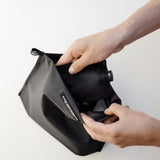 Matador Flatpak zipper toiletry case with compact design and durable fabric, suitable for travel and personal grooming essentials.