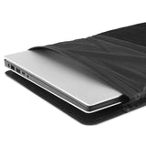Matador laptop base layer case in sleek black with durable fabric and minimalist design, perfect for protecting and carrying a laptop.