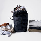 Black Matador packable laundry bag with drawstring closure, lightweight and foldable for easy storage and transport.