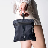 Matador packable laundry bag in black, lightweight and foldable for easy carrying and storage.