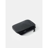 Matador Global Travel Stash packing organizer in black, compact design with multiple compartments for travel essentials.