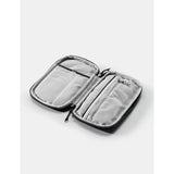 Matador Global Travel Stash packing organizer with multiple compartments for efficient travel storage, black fabric, compact design.
