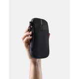 Matador Global Travel Stash packing organizer in black with multiple compartments for efficient travel storage.