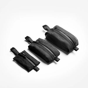 Matador mesh organizer bag set for packing and travel organization, featuring multiple lightweight, breathable storage pouches.