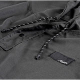 Matador Nanodry packable towel poncho in slate blue, lightweight and quick-drying for travel and outdoor use.
