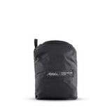 Matador Refraction packable duffle bag in compact form, showing its lightweight, water-resistant design and sleek appearance.