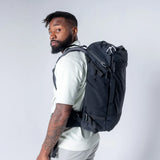 Matador GlobeRider35 travel backpack in black with multiple compartments and adjustable straps, designed for convenient travel.