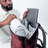 Matador GlobeRider35 travel backpack in garnet color with multiple compartments and adjustable straps, designed for travel adventure.