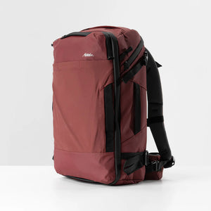 Matador GlobeRider35 travel backpack in garnet color with multiple compartments and adjustable straps, designed for efficient travel.