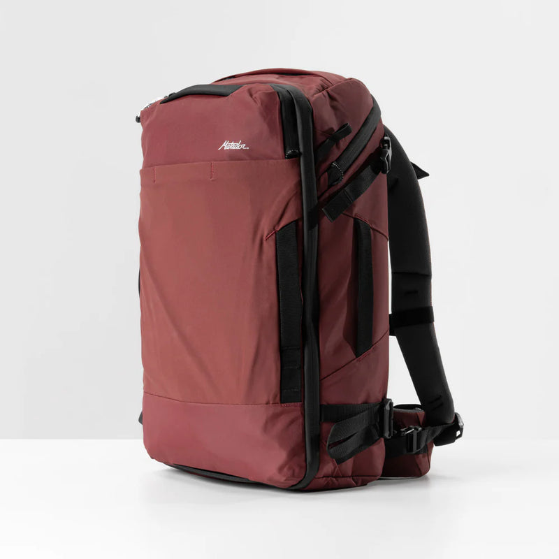 Matador GlobeRider35 travel backpack in garnet color with multiple compartments and adjustable straps, designed for efficient travel.