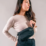 Matador ReFraction™ packable waist pack with adjustable strap and compact design, ideal for travel and outdoor activities.