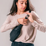 Matador ReFraction™ packable waist sling with adjustable strap and compact design, suitable for outdoor activities.