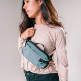 Matador ReFraction™ Packable Sling waist pack with adjustable strap and compact design, ideal for hands-free carrying.