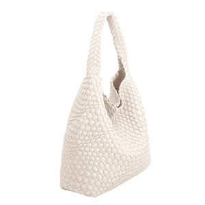 White Melie Bianco Johanna tote bag with structured design and dual top handles, shown from a side angle.