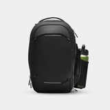 Black Nomatic Navigator Series 15L backpack with water bottle pocket and multiple compartments, designed for travel and daily use.