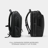 Black Nomatic Travel Pack 20L-30L with expandable design, featuring multiple compartments and sleek nylon exterior for versatile travel.