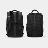 Black Nomatic Travel Pack 20L-30L with adjustable straps, designed for versatile travel and easy organization.